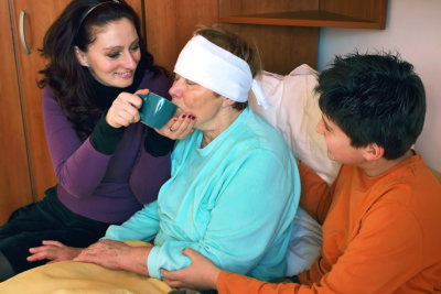 woman caring a senior woman