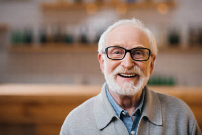 a senior man smiling